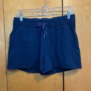Lululemon Athletica Navy on the fly shorts